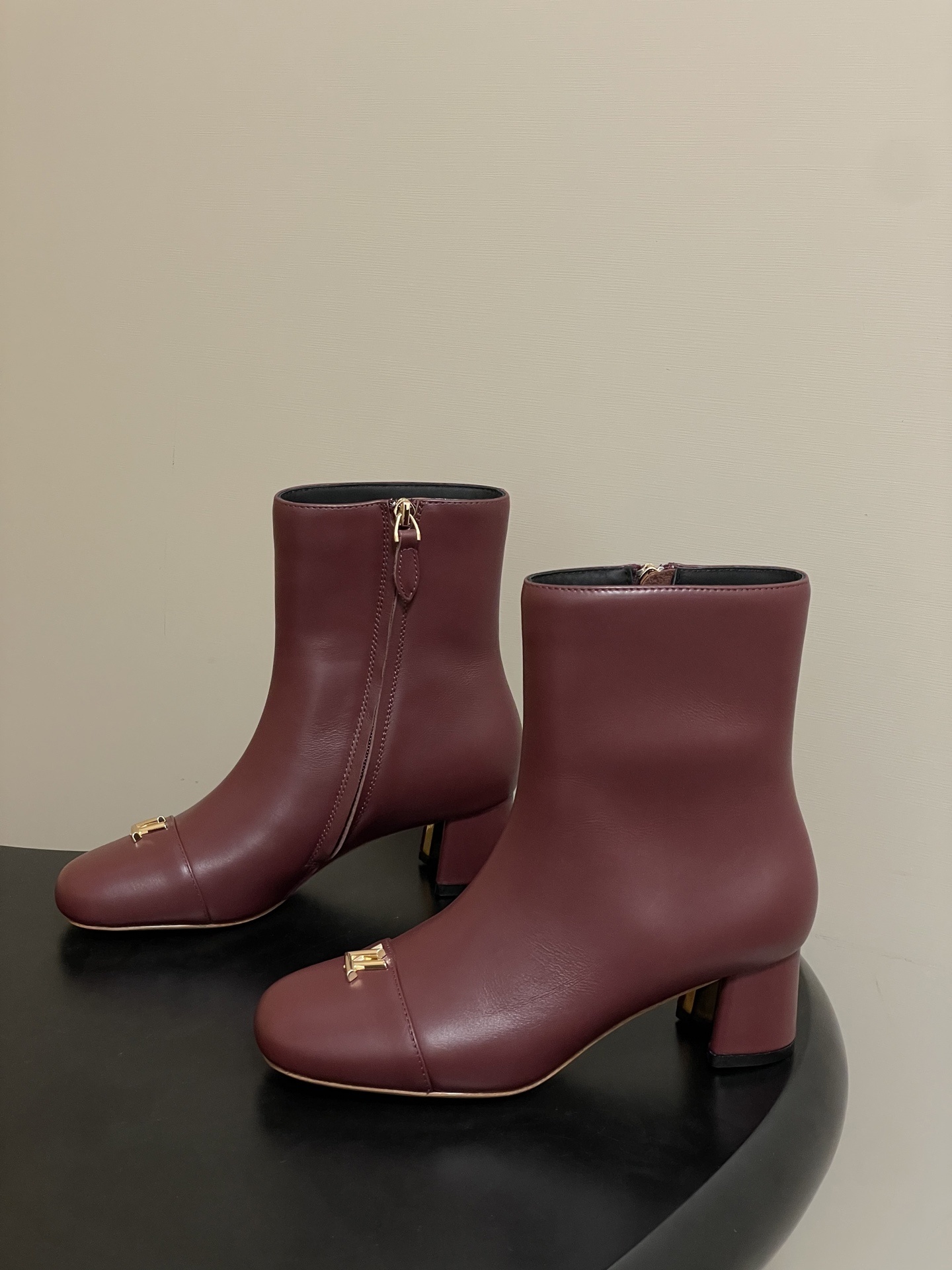 Elegant Burgundy Leather Ankle Boots with Gold Logo & Block Heel