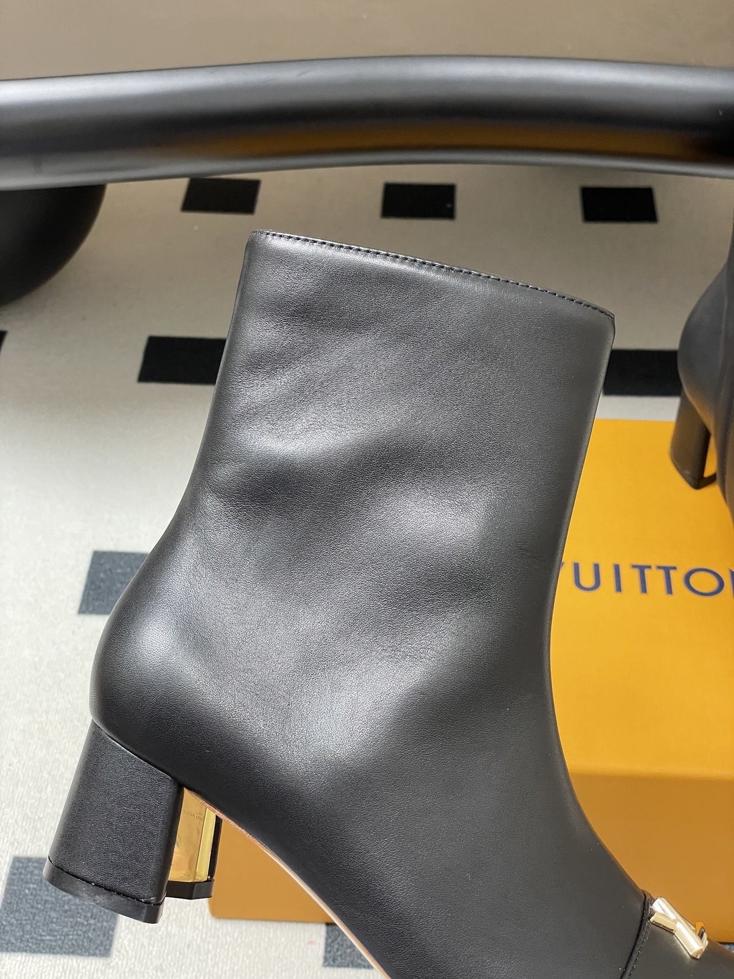 Luxury Black Leather Ankle Boots with Gold LV Initials