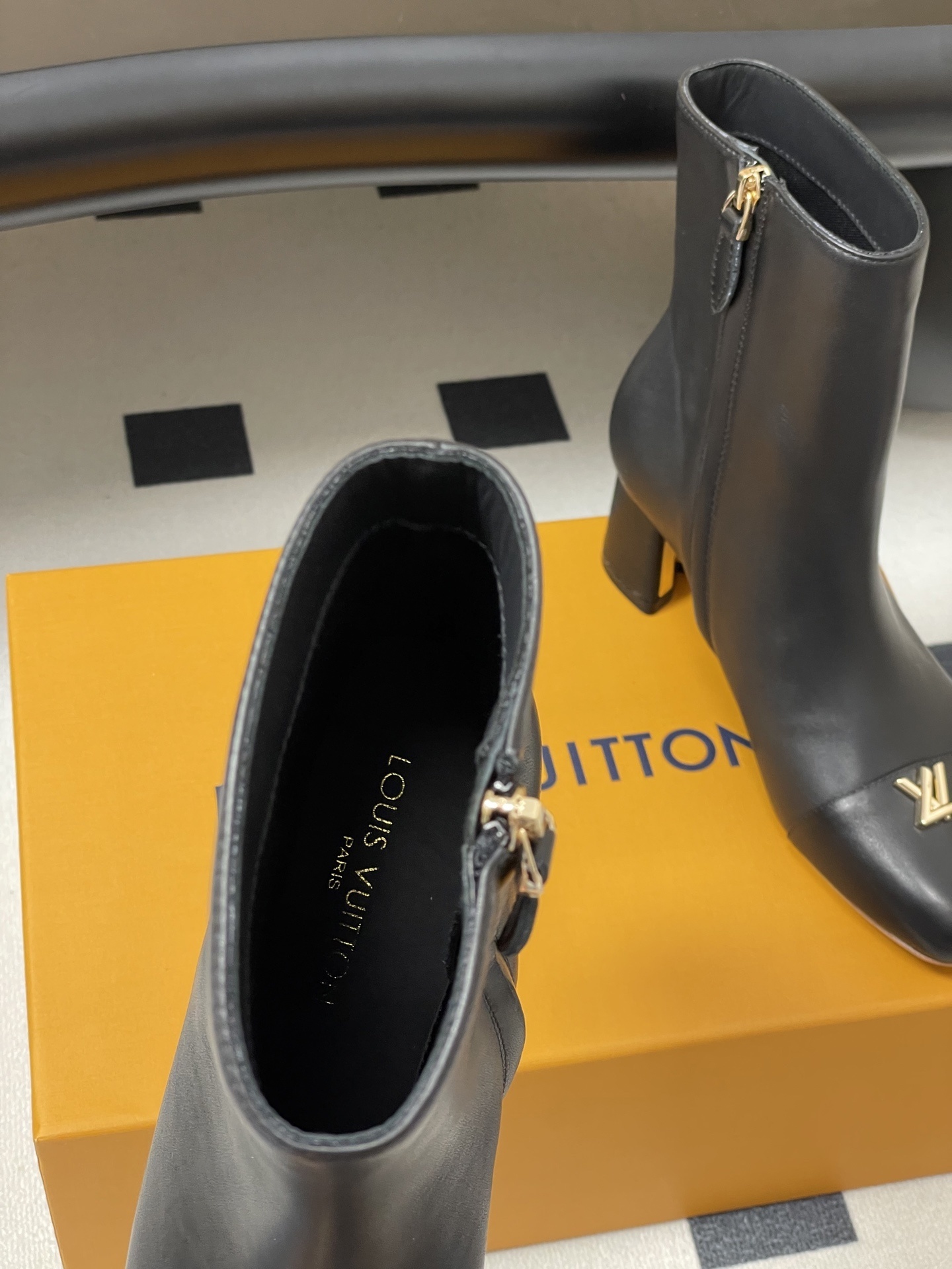 Luxury Black Leather Ankle Boots with Gold LV Initials