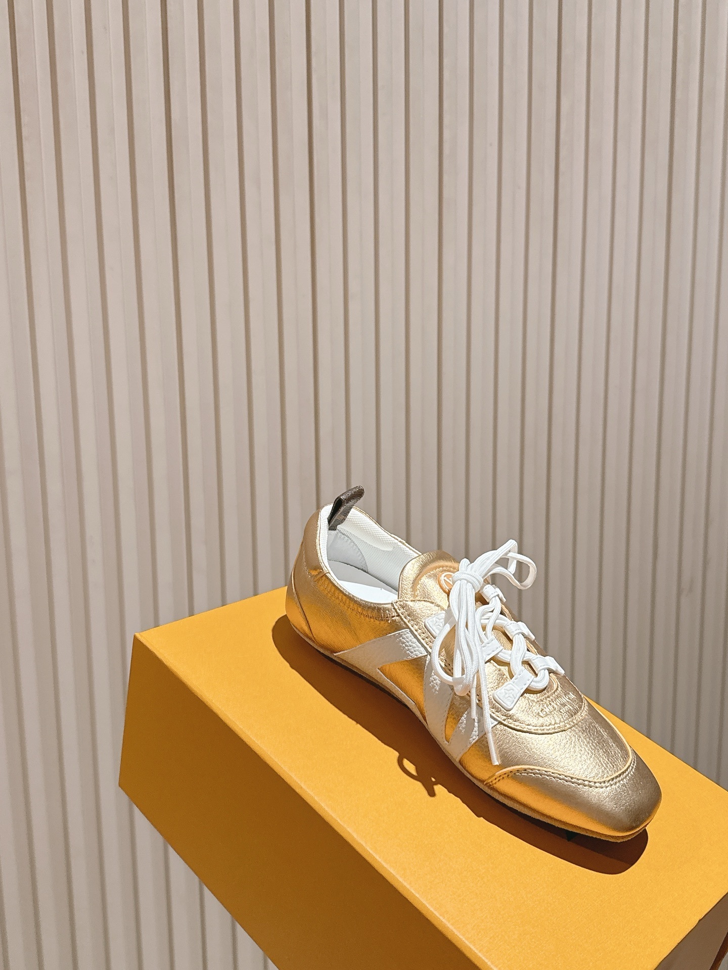 Louis Vuitton Women's Gold Metallic Leather Sneakers