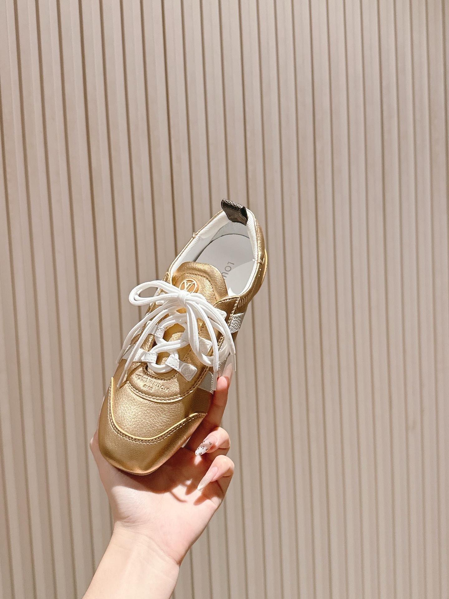 Louis Vuitton Women's Gold Metallic Leather Sneakers