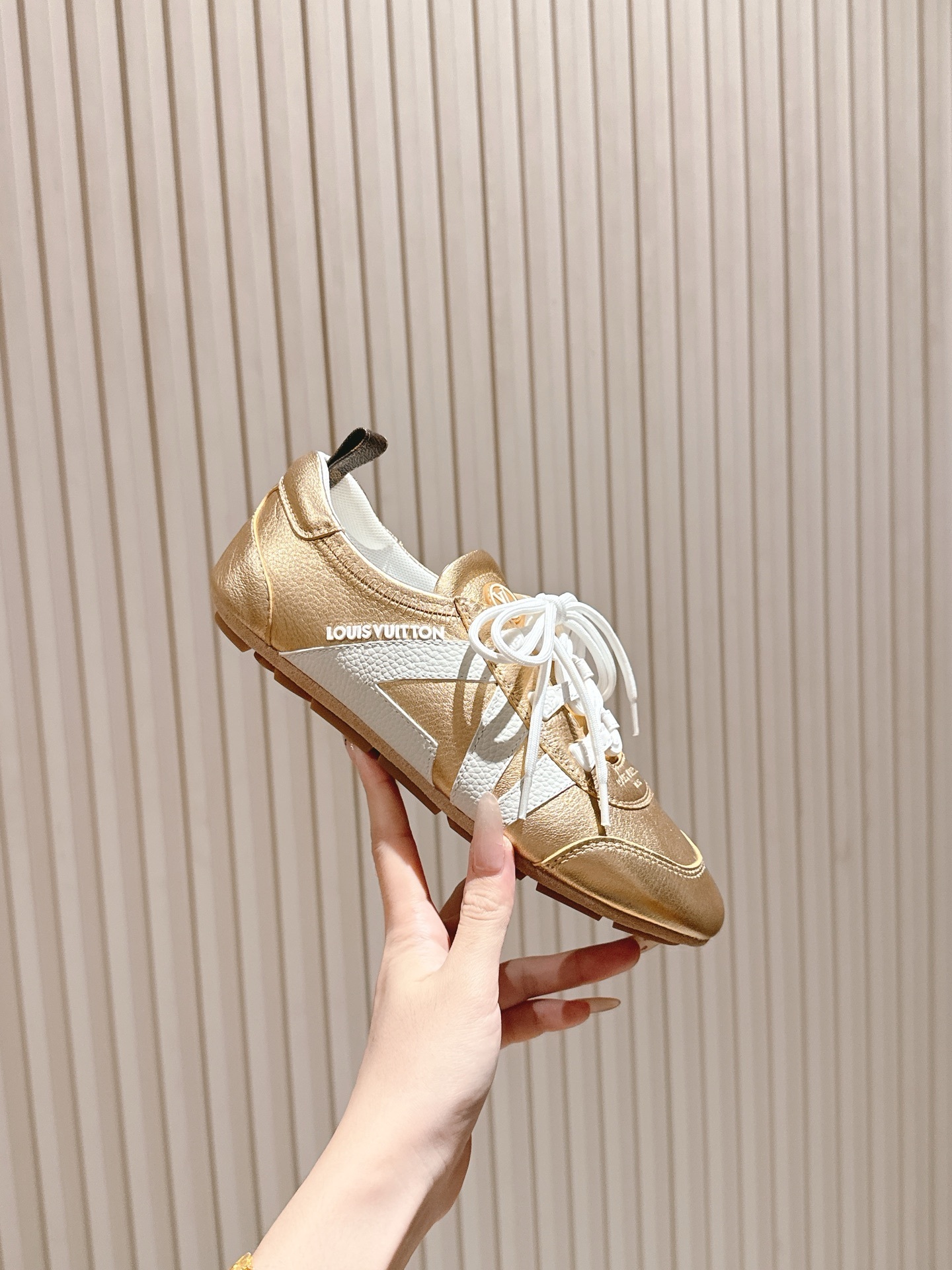 Louis Vuitton Women's Gold Metallic Leather Sneakers