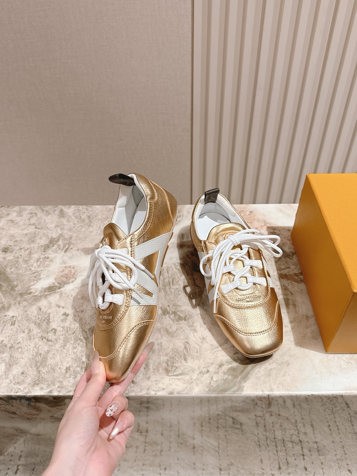 Louis Vuitton Women's Gold Metallic Leather Sneakers