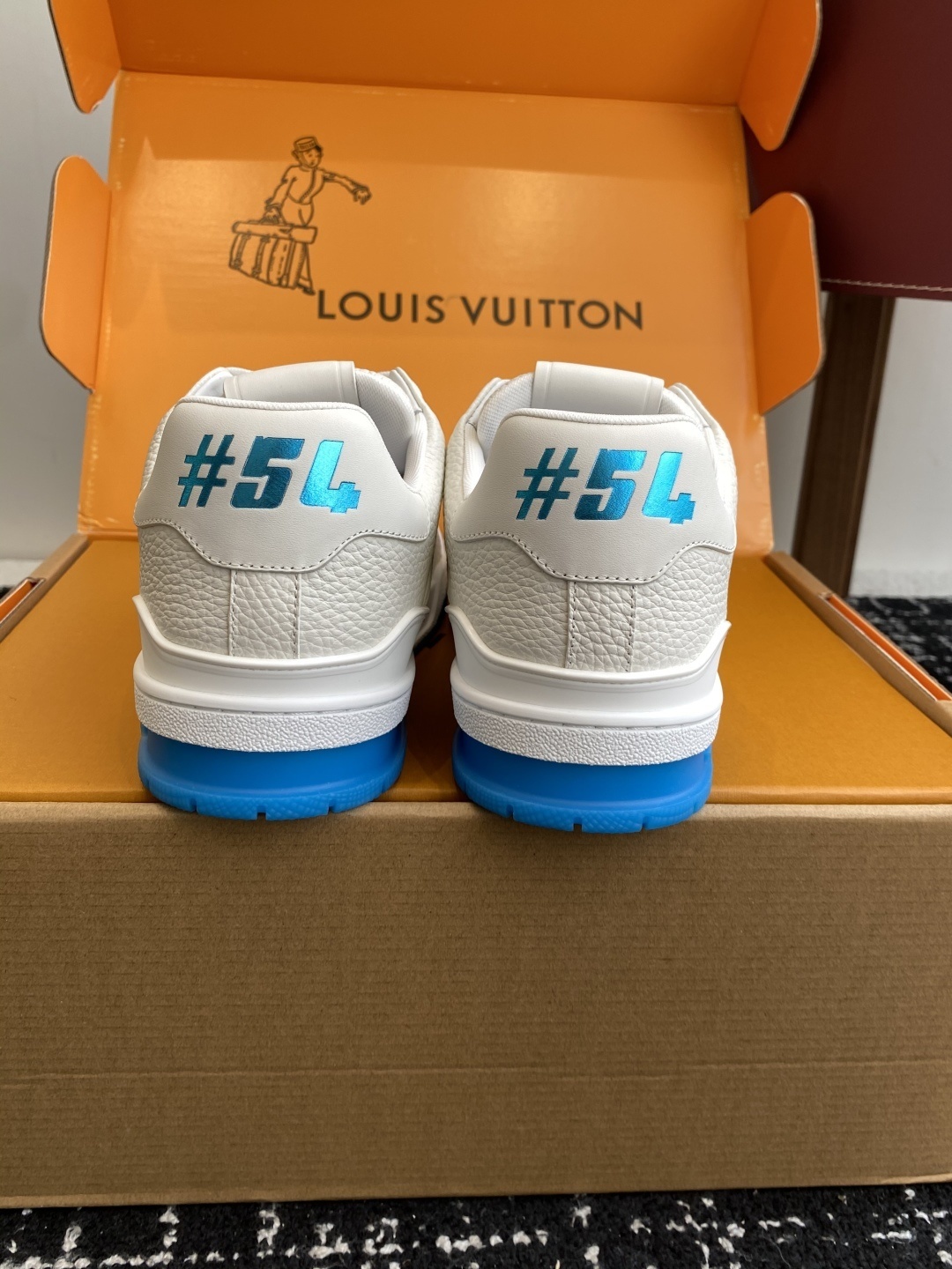Louis Vuitton LV Trainer White & Light Blue Grained Leather Sneakers