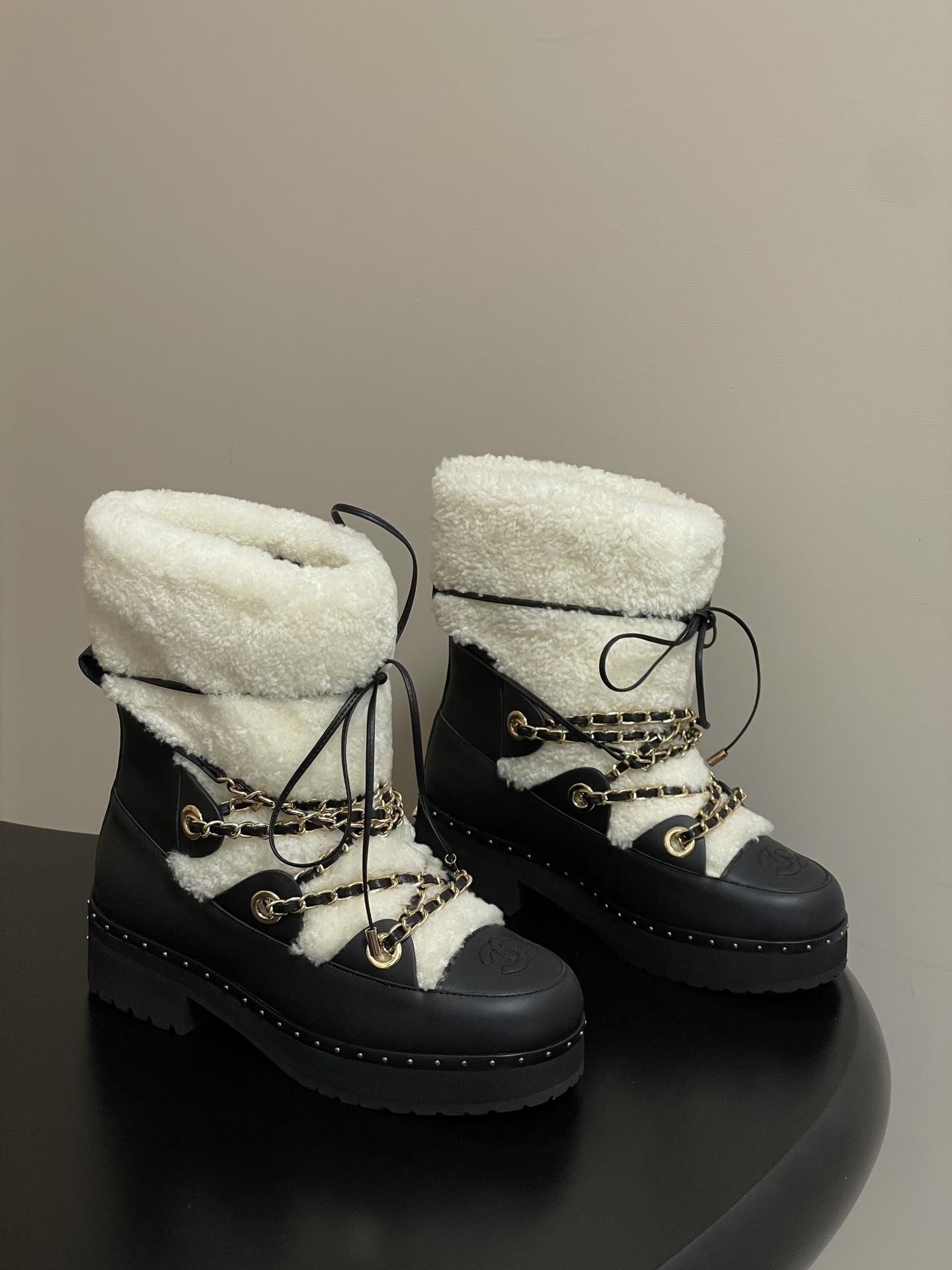 Chanel Shearling and Leather Boots with Gold Chain Details – Black/White