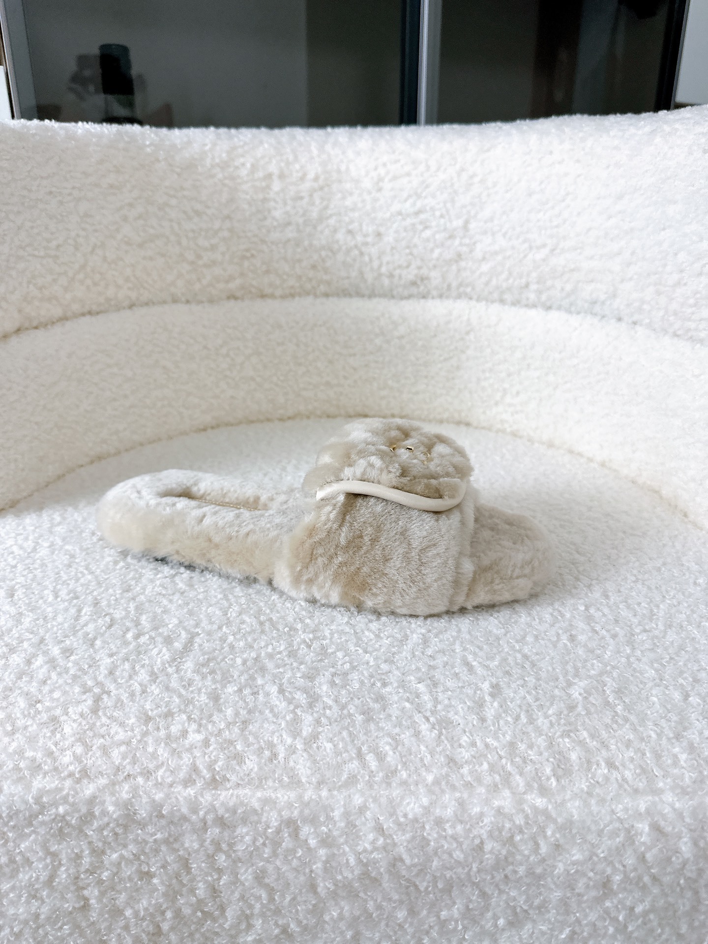 A pair of luxury Chanel beige shearling quilted slides with gold CC logo inside a white Chanel box - Hình 5