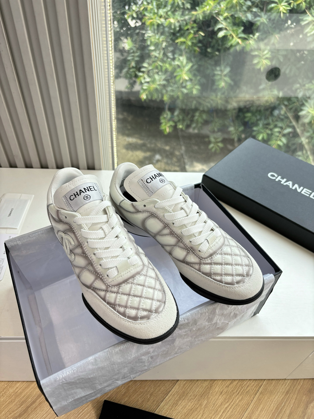 Chanel White Quilted Leather Sneakers with CC Logo – Luxury Shoes