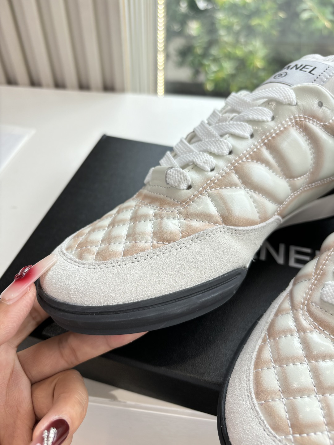 Luxury Chanel quilted leather sneakers in white with peach gradient accents and interlocking CC logo - Hình 9