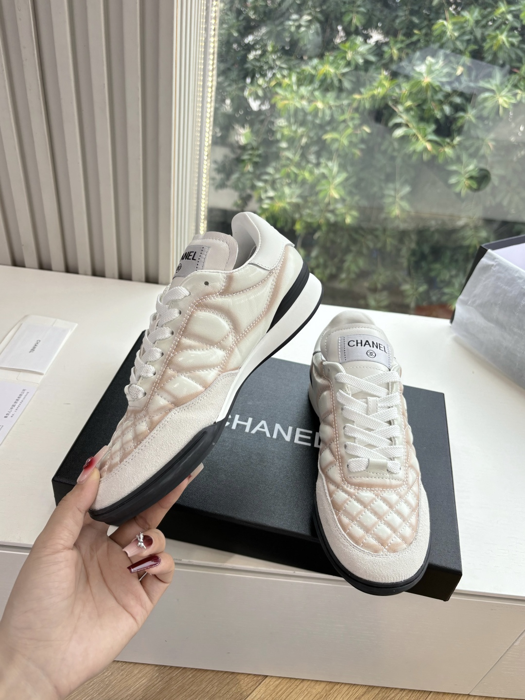 Luxury Chanel quilted leather sneakers in white with peach gradient accents and interlocking CC logo - Hình 5