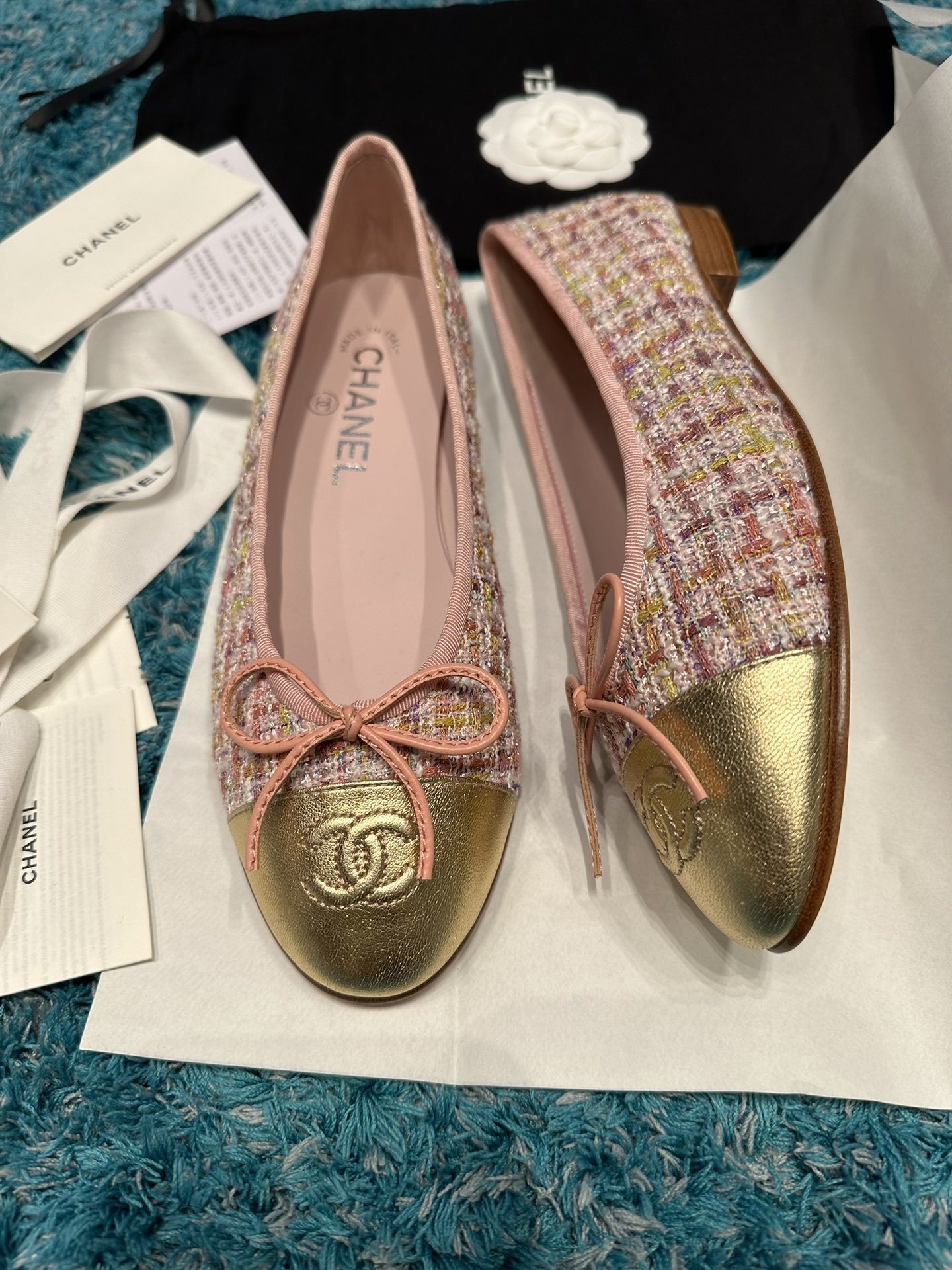 Pair of Chanel pink tweed ballet flats with metallic gold toe caps and CC logo in original packaging. - Hình 2