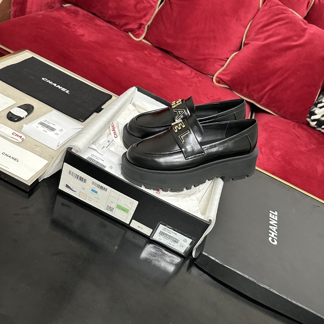 Chanel Black Leather Platform Loafers with Gold Logo Lettering