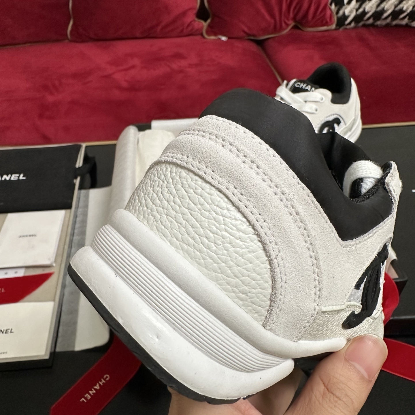 Luxury Chanel sneakers in white mesh and leather with black interlocking CC logo and original packaging. - Hình 8