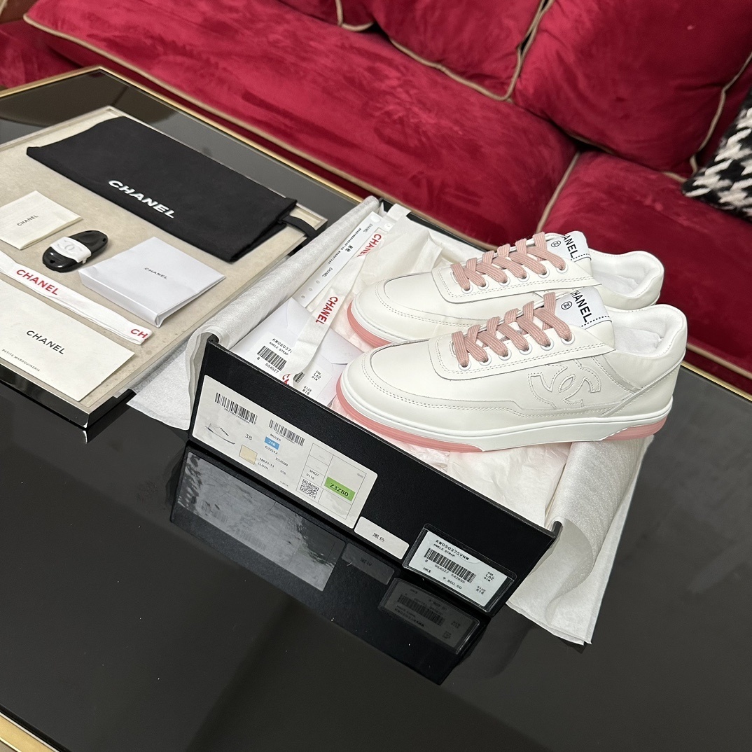 Chanel Women’s White Leather Sneakers with Pink Laces & Sole