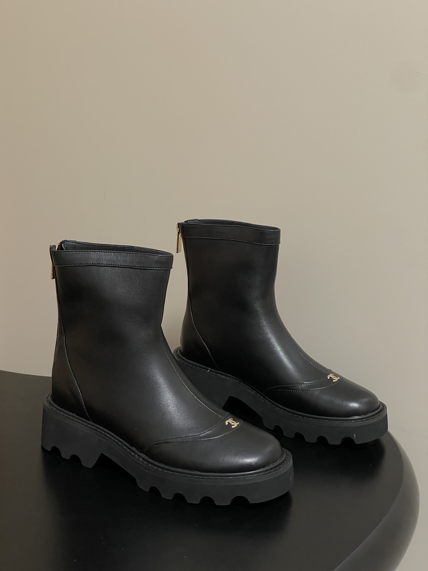 Luxury Black Leather Platform Ankle Boots with Gold Logo Detail