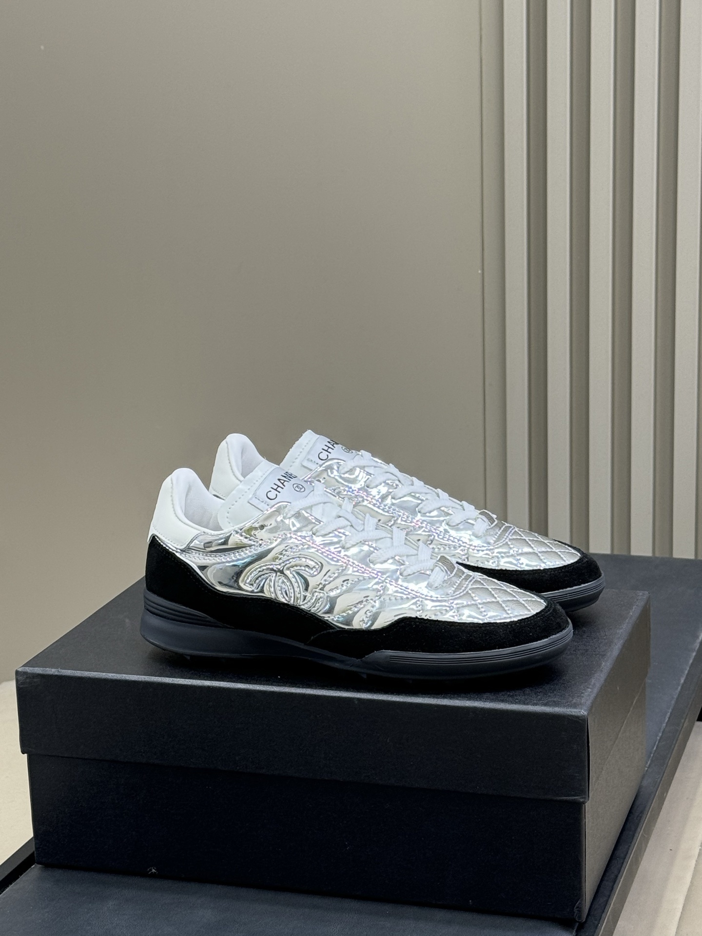 Chanel Metallic Silver Quilted Sneakers – Luxury Fashion Trainers