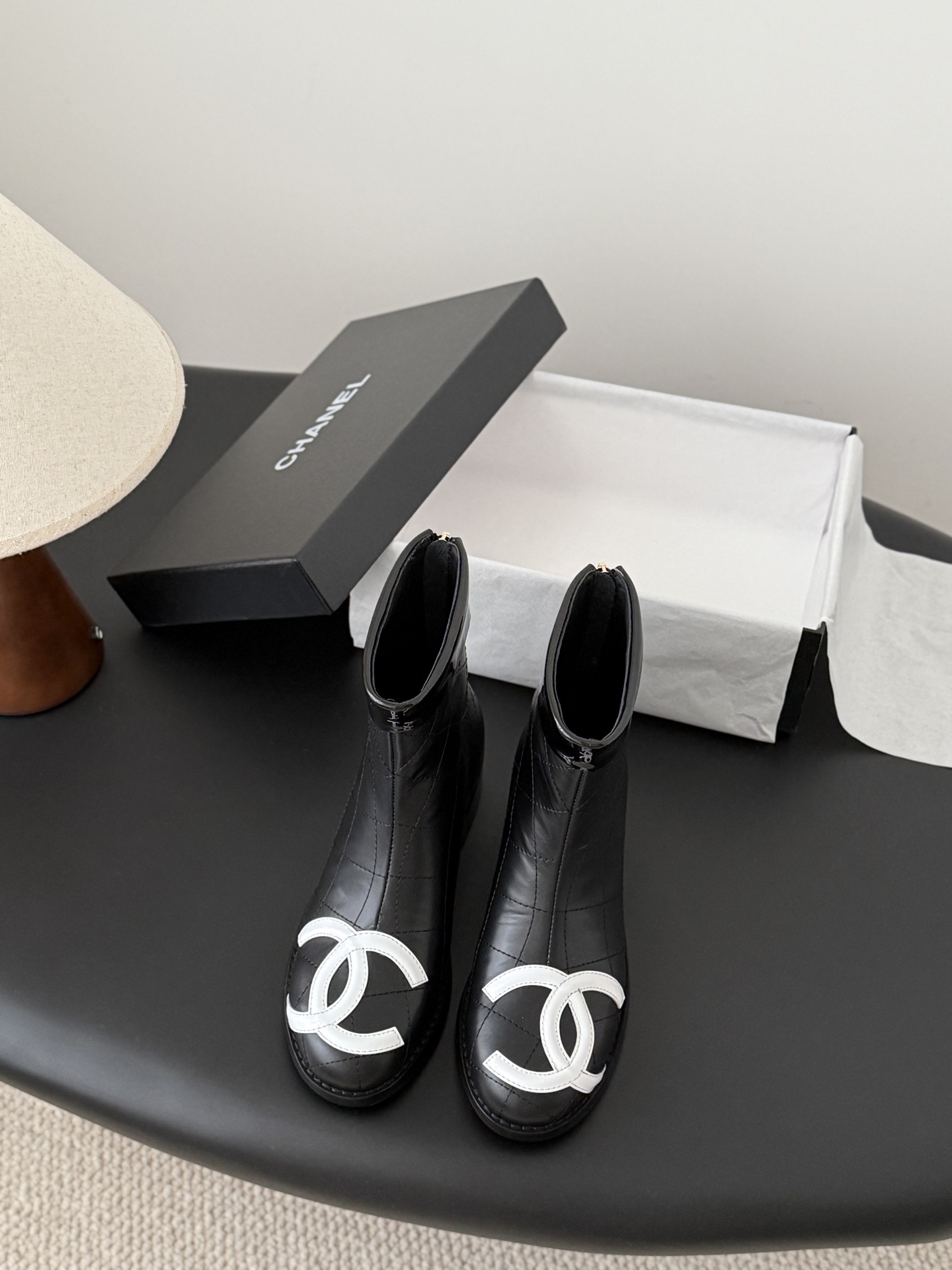Chanel Quilted Leather Ankle Boots with White CC Logo