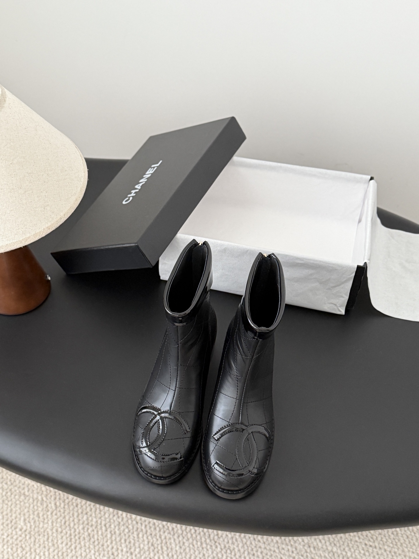 Luxury Chanel Black Quilted Leather Ankle Boots with CC Logo