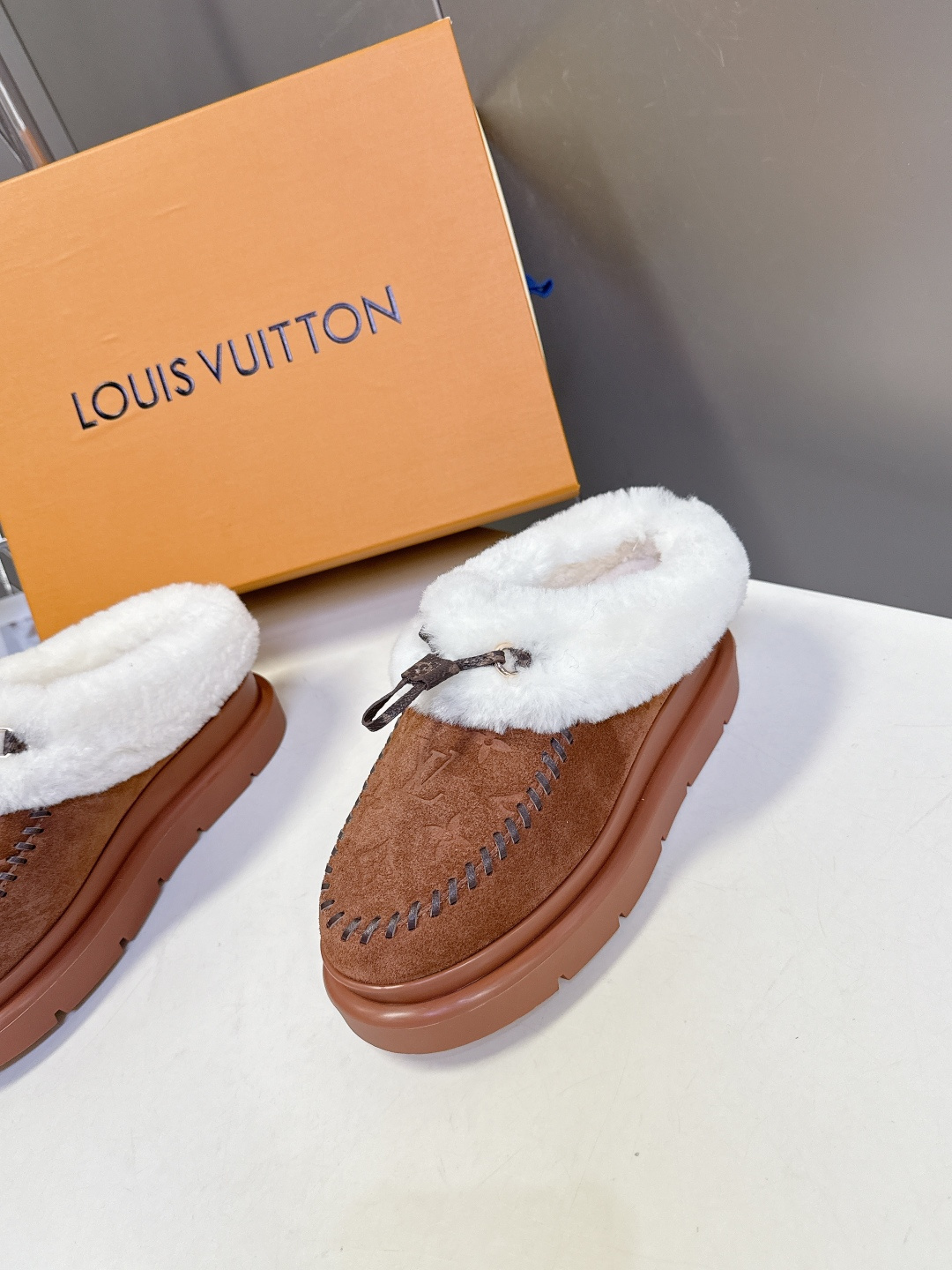 Louis Vuitton Brown Monogram Suede Mules with White Shearling Trim