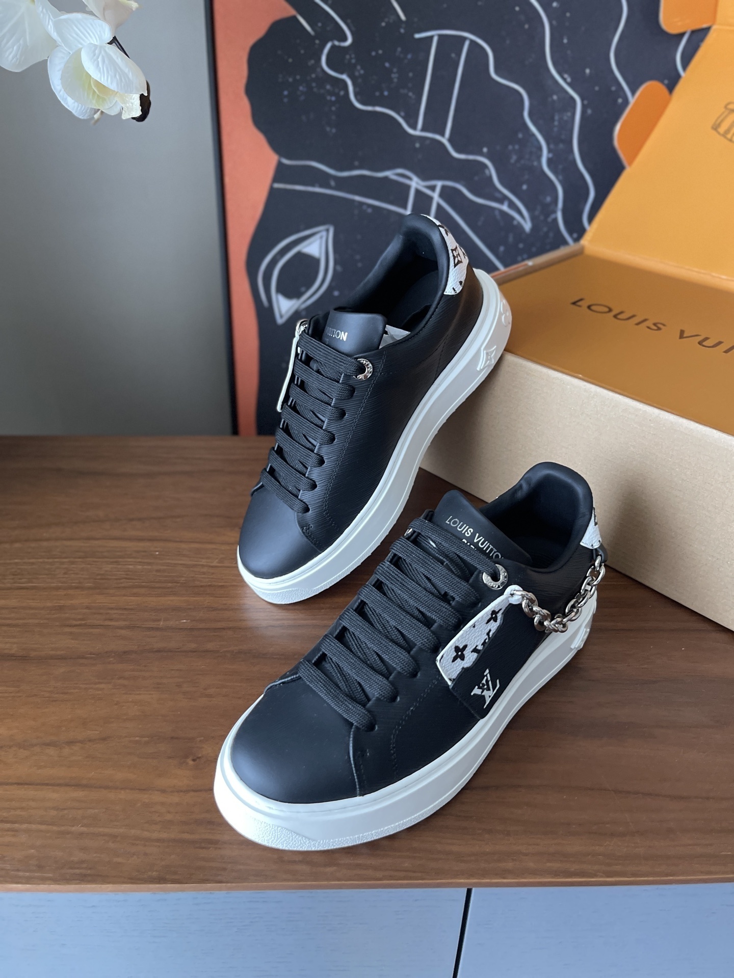 Louis Vuitton Black Leather Sneakers with Silver Chain Detail