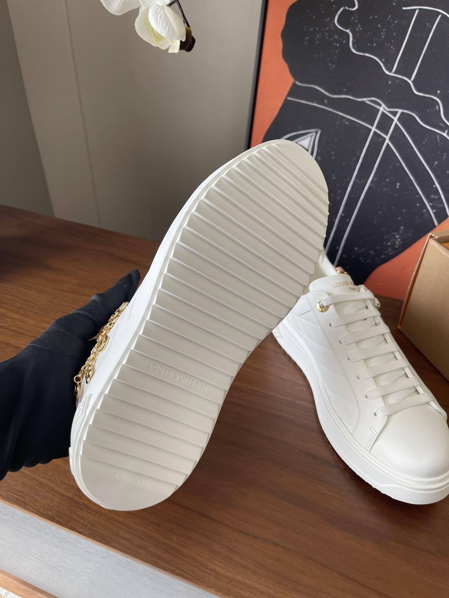 Louis Vuitton Women's White Quilted Platform Sneakers with Gold Charms