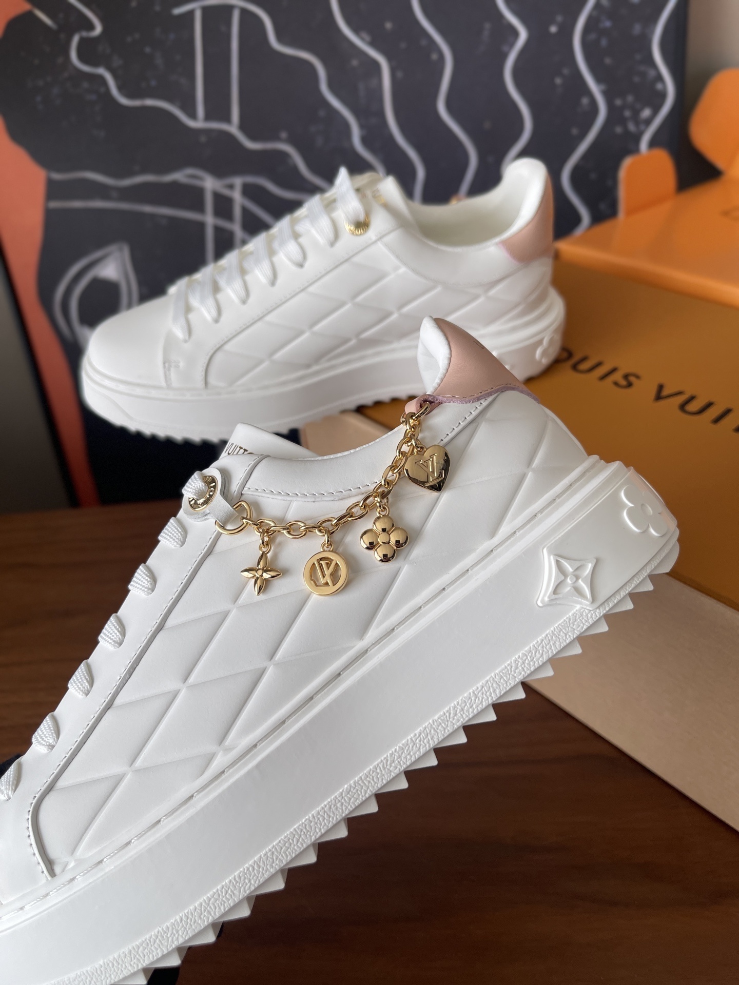 Louis Vuitton Women's White Quilted Platform Sneakers with Gold Charms