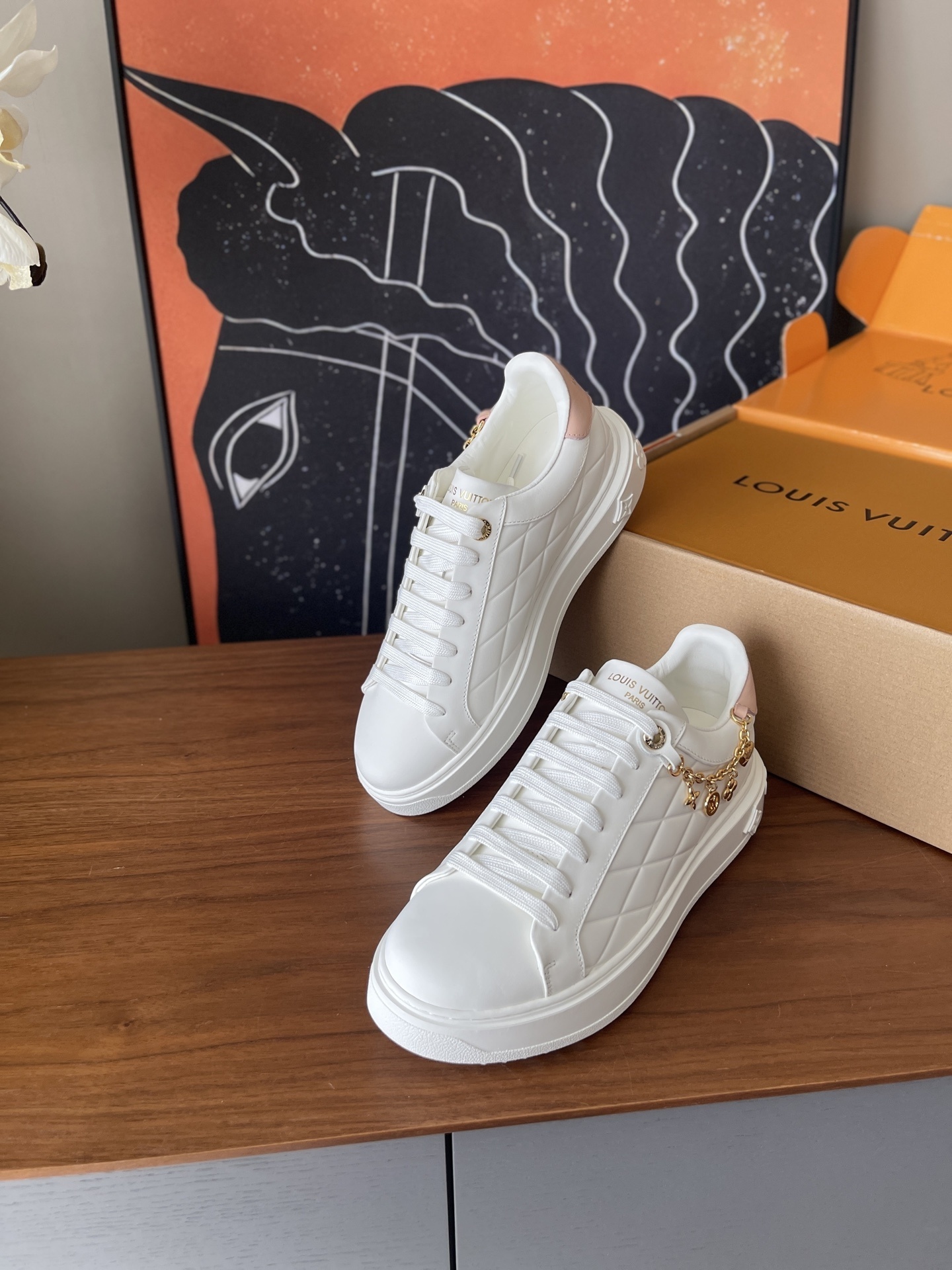 Louis Vuitton Women's White Quilted Platform Sneakers with Gold Charms