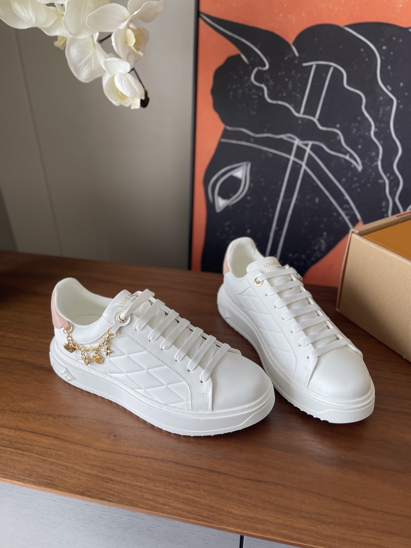 Louis Vuitton Women's White Quilted Platform Sneakers with Gold Charms