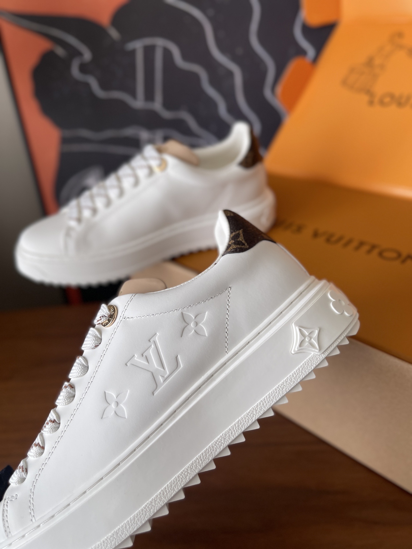 Louis Vuitton Women's White Leather Sneakers with Monogram Charm