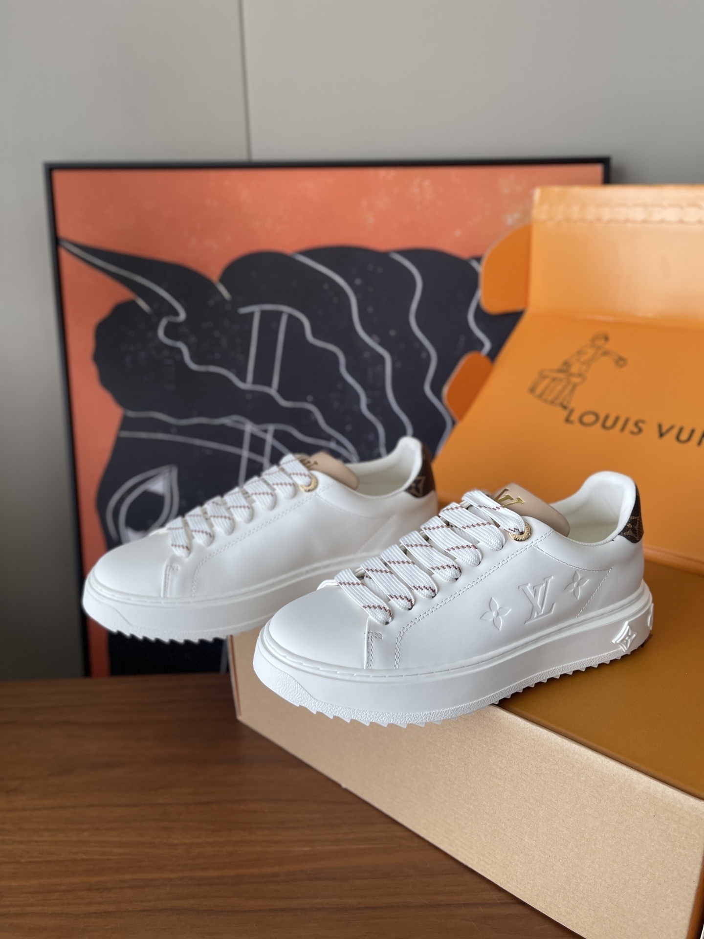 Louis Vuitton Women's White Leather Sneakers with Monogram Charm