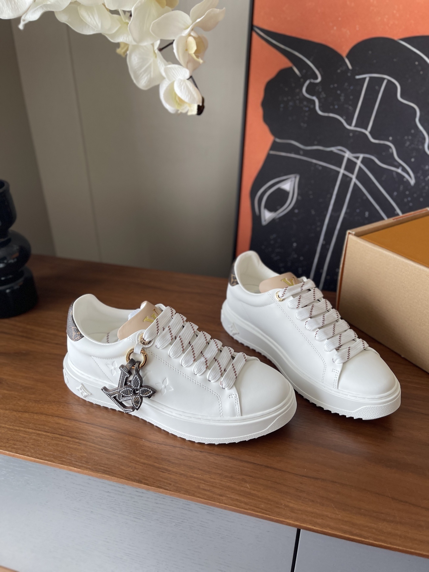 Louis Vuitton Women's White Leather Sneakers with Monogram Charm