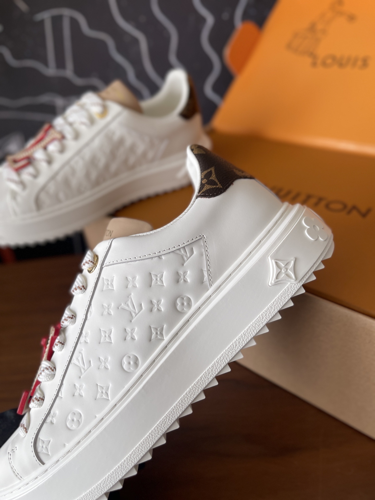 Louis Vuitton Time Out White Monogram Embossed Leather Sneakers