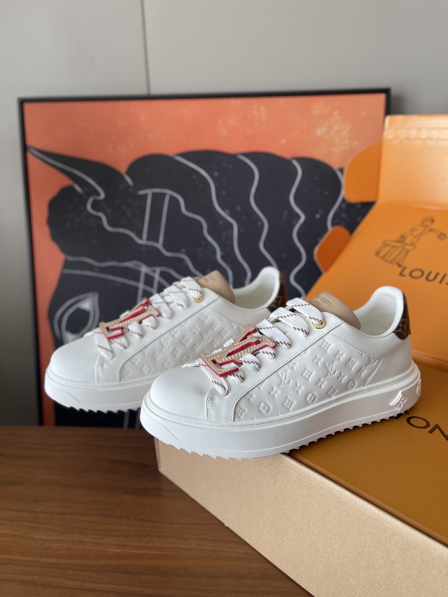 Louis Vuitton Time Out White Monogram Embossed Leather Sneakers