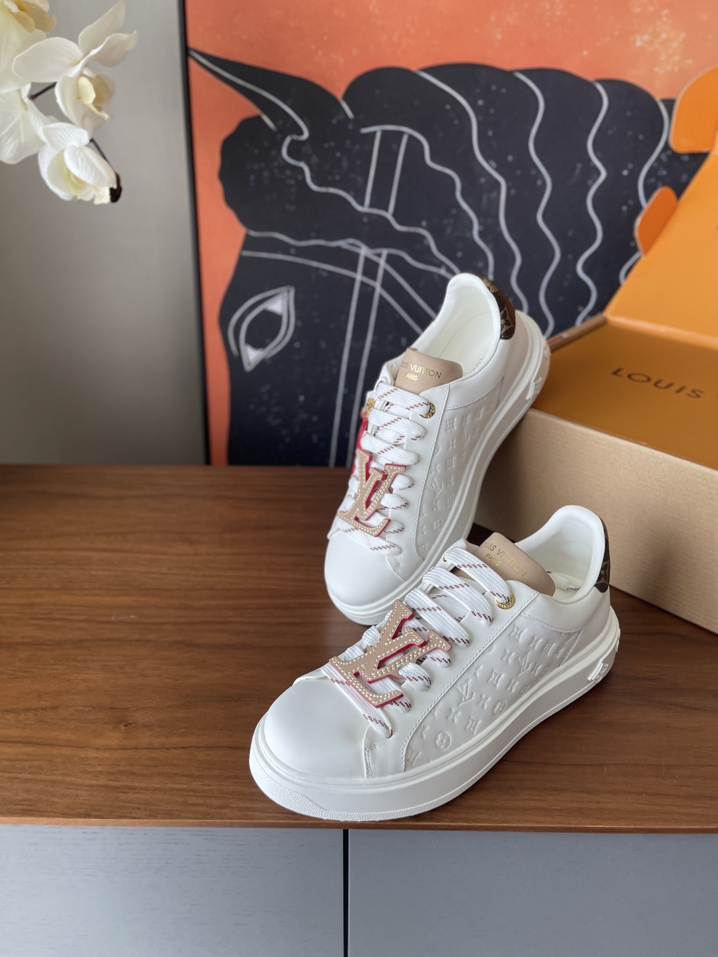 Louis Vuitton Time Out White Monogram Embossed Leather Sneakers
