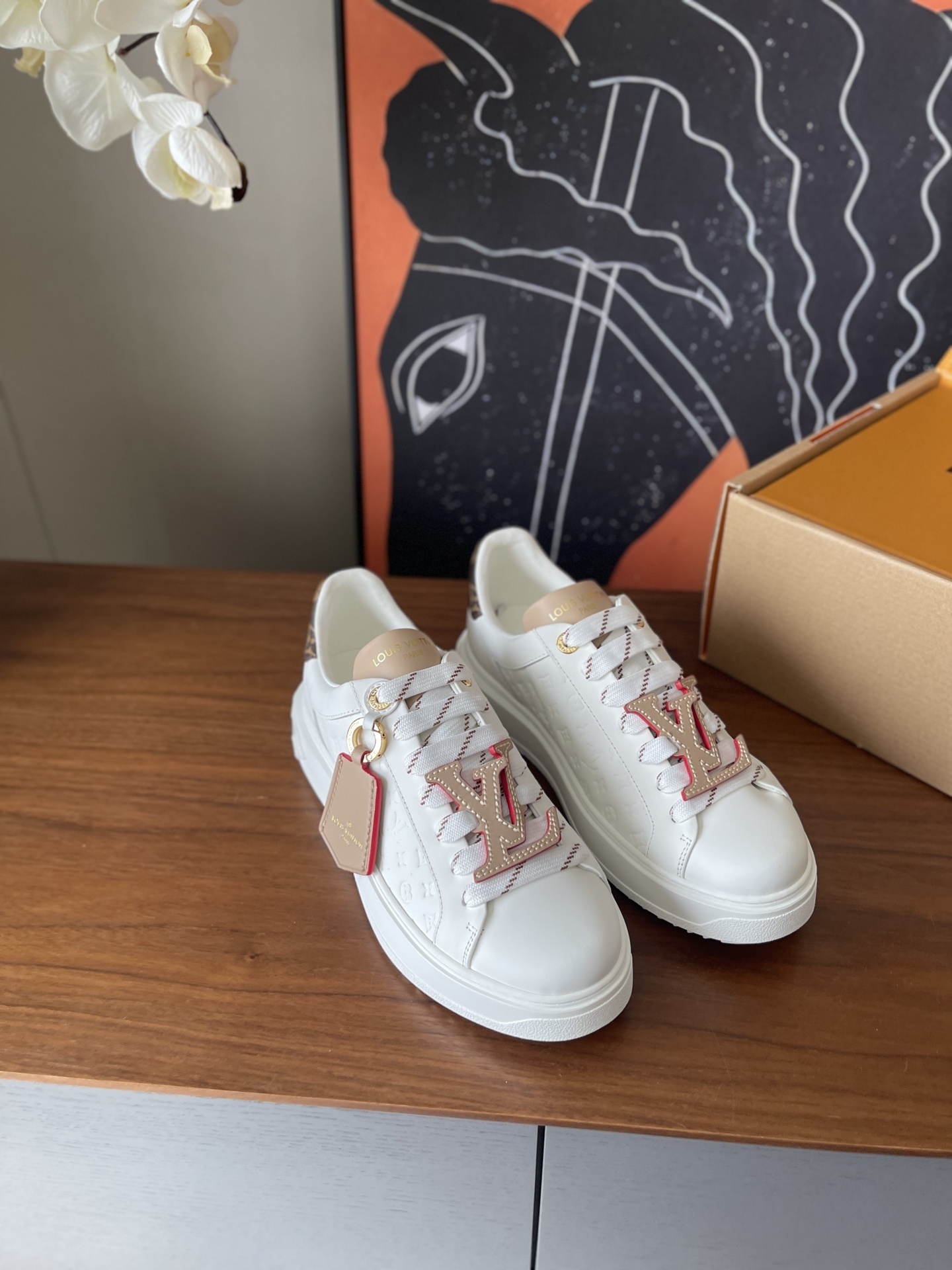 Louis Vuitton Time Out White Monogram Embossed Leather Sneakers