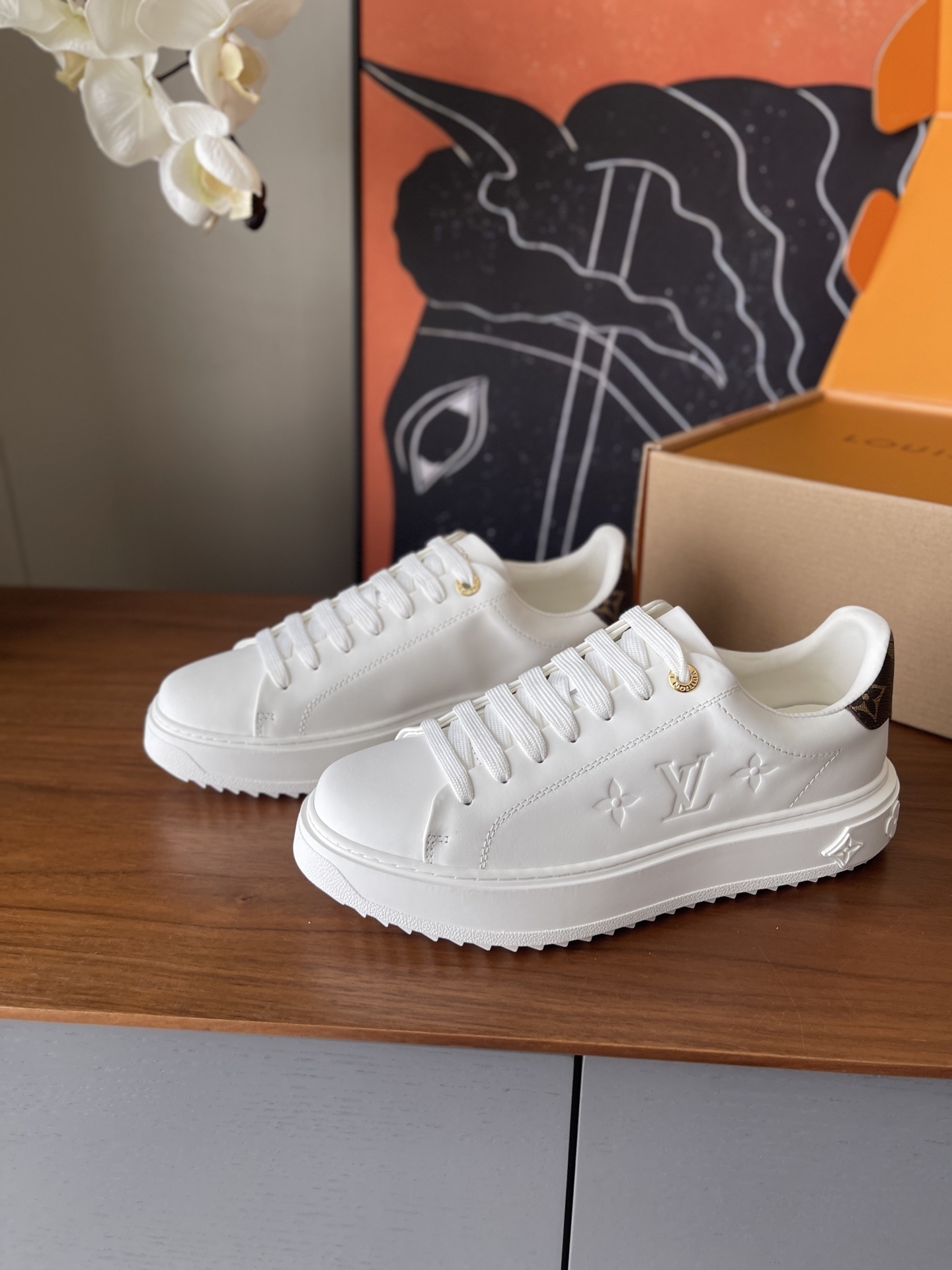 Louis Vuitton Women's White Leather Monogram Accent Sneakers