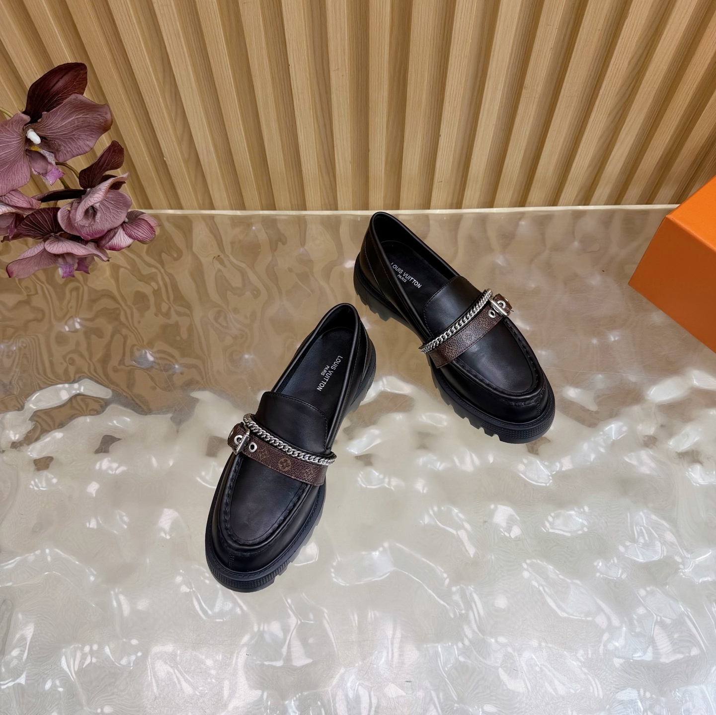 Luxury Women's Black Leather Lug Sole Loafers with Monogram Strap