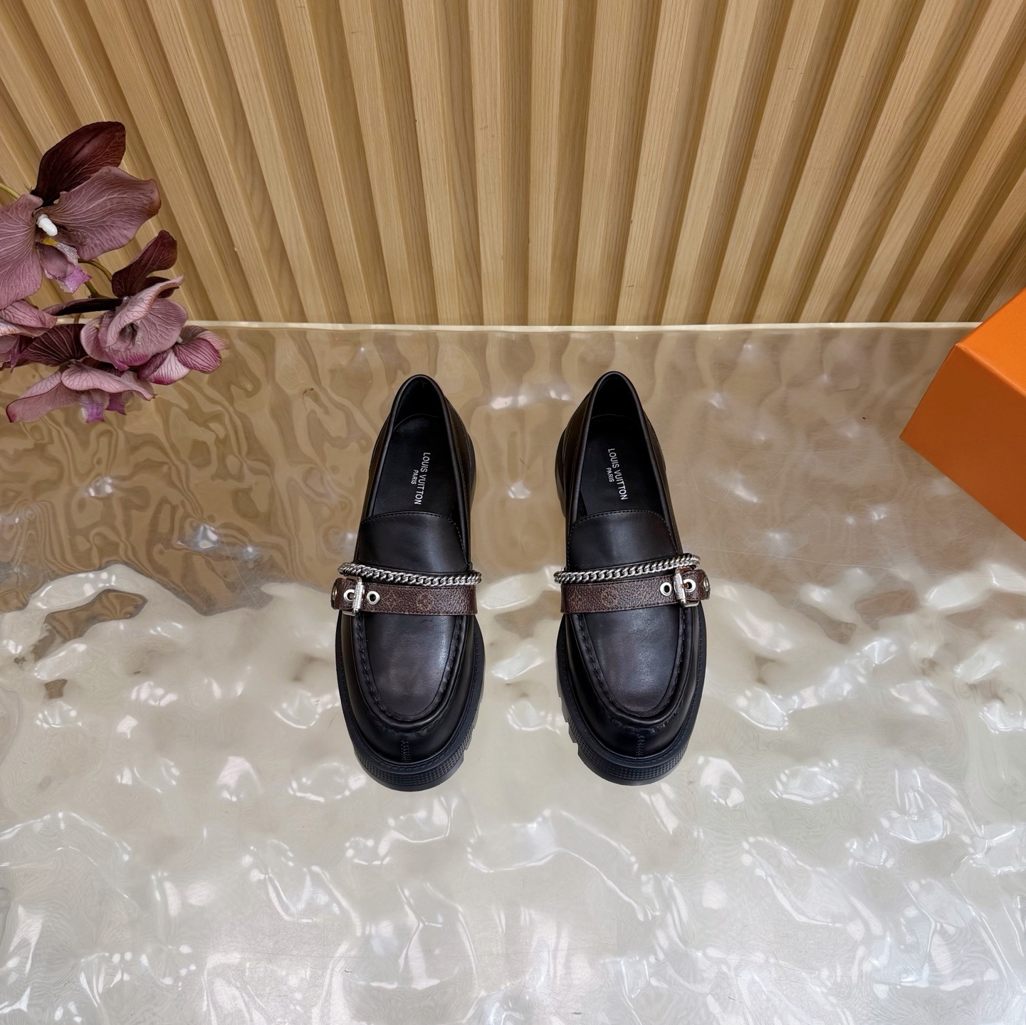 Luxury Women's Black Leather Lug Sole Loafers with Monogram Strap