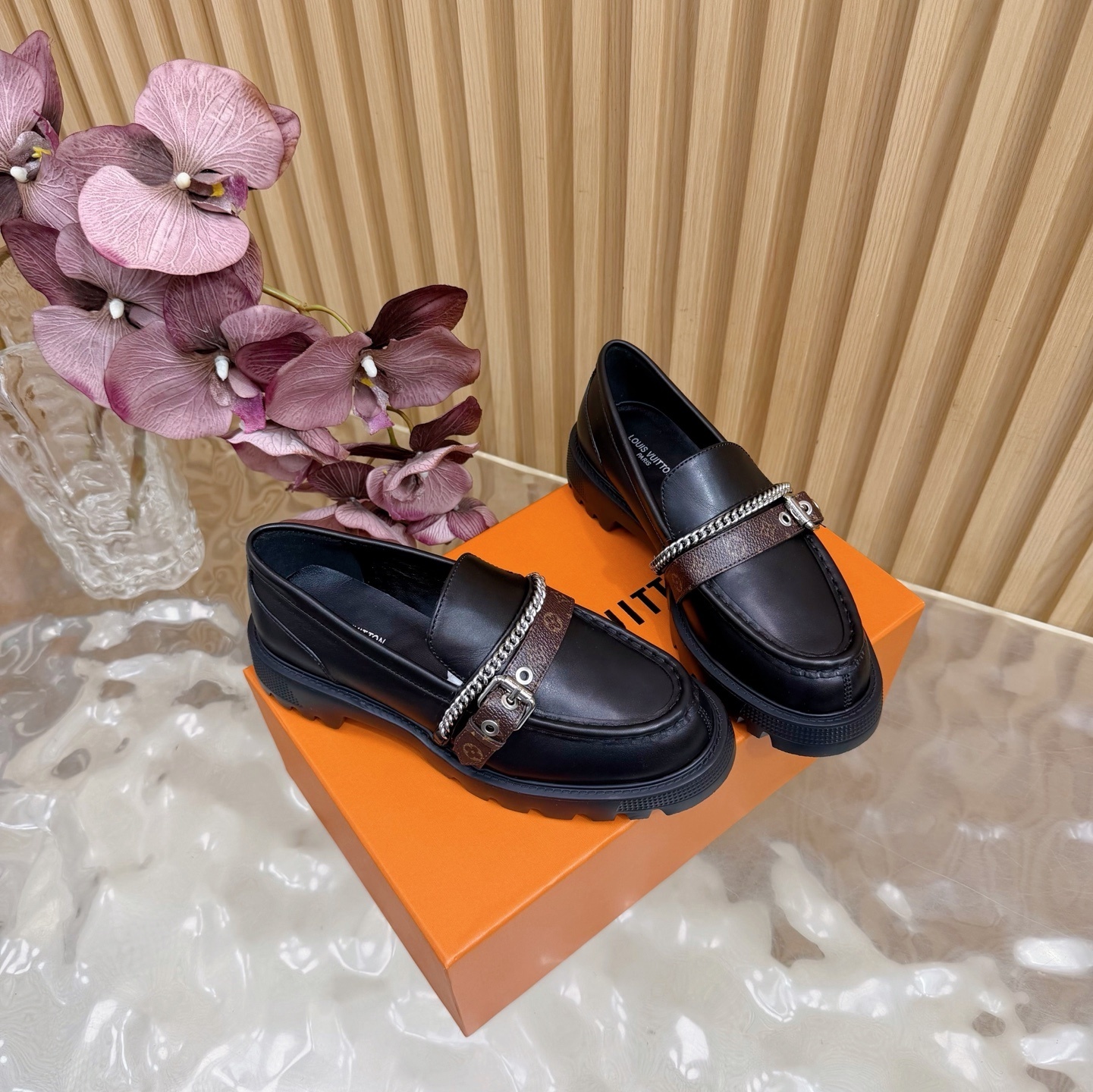 Luxury Women's Black Leather Lug Sole Loafers with Monogram Strap