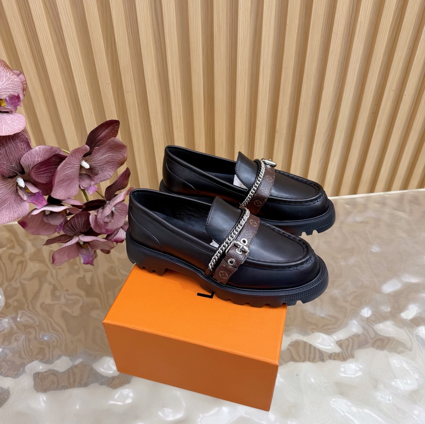 Luxury Women’s Black Leather Lug Sole Loafers with Monogram Strap