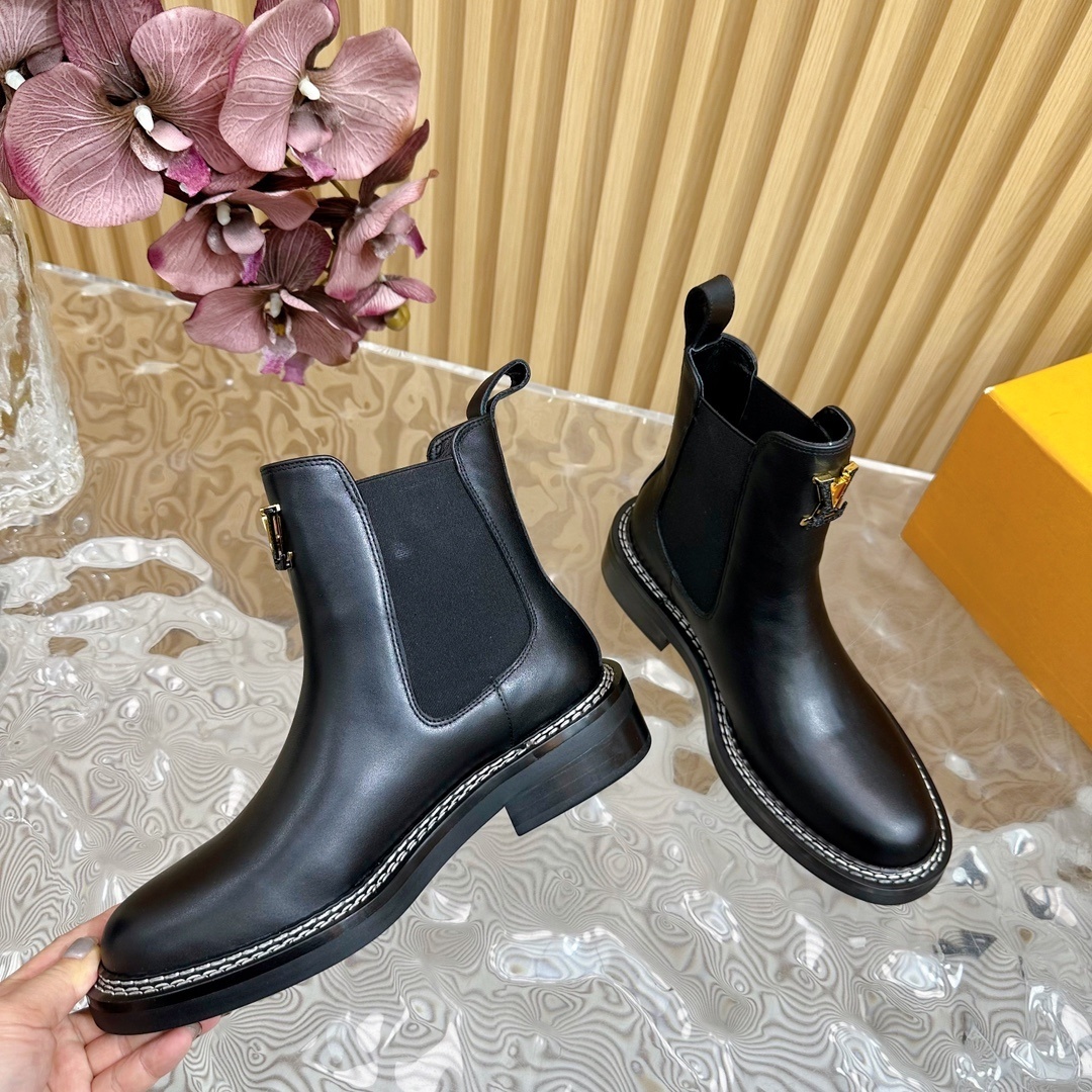 LV Black Leather Chelsea Ankle Boots with Gold Logo Details
