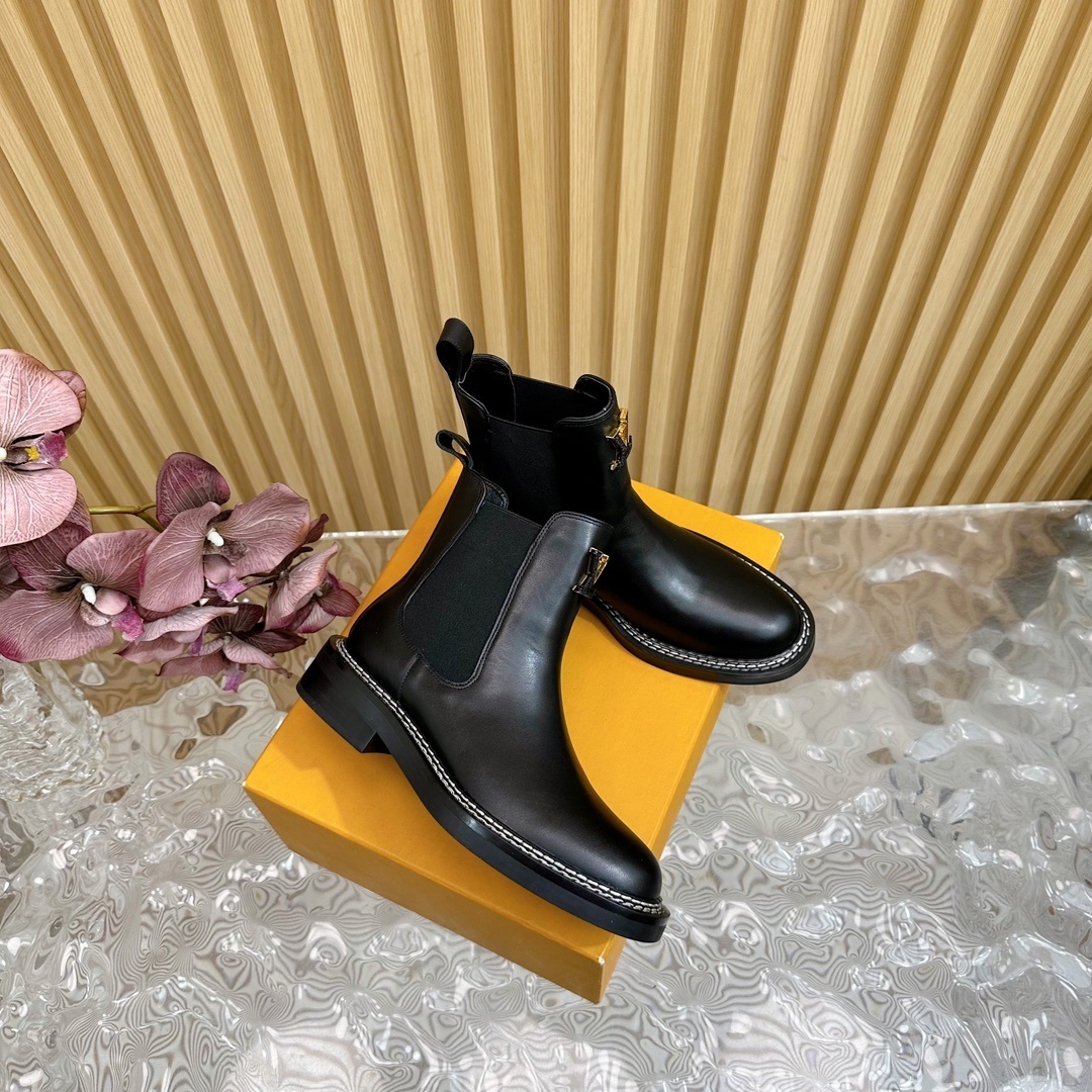 LV Black Leather Chelsea Ankle Boots with Gold Logo Details