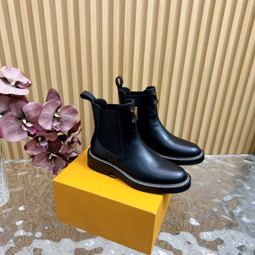 LV Black Leather Chelsea Ankle Boots with Gold Logo Details