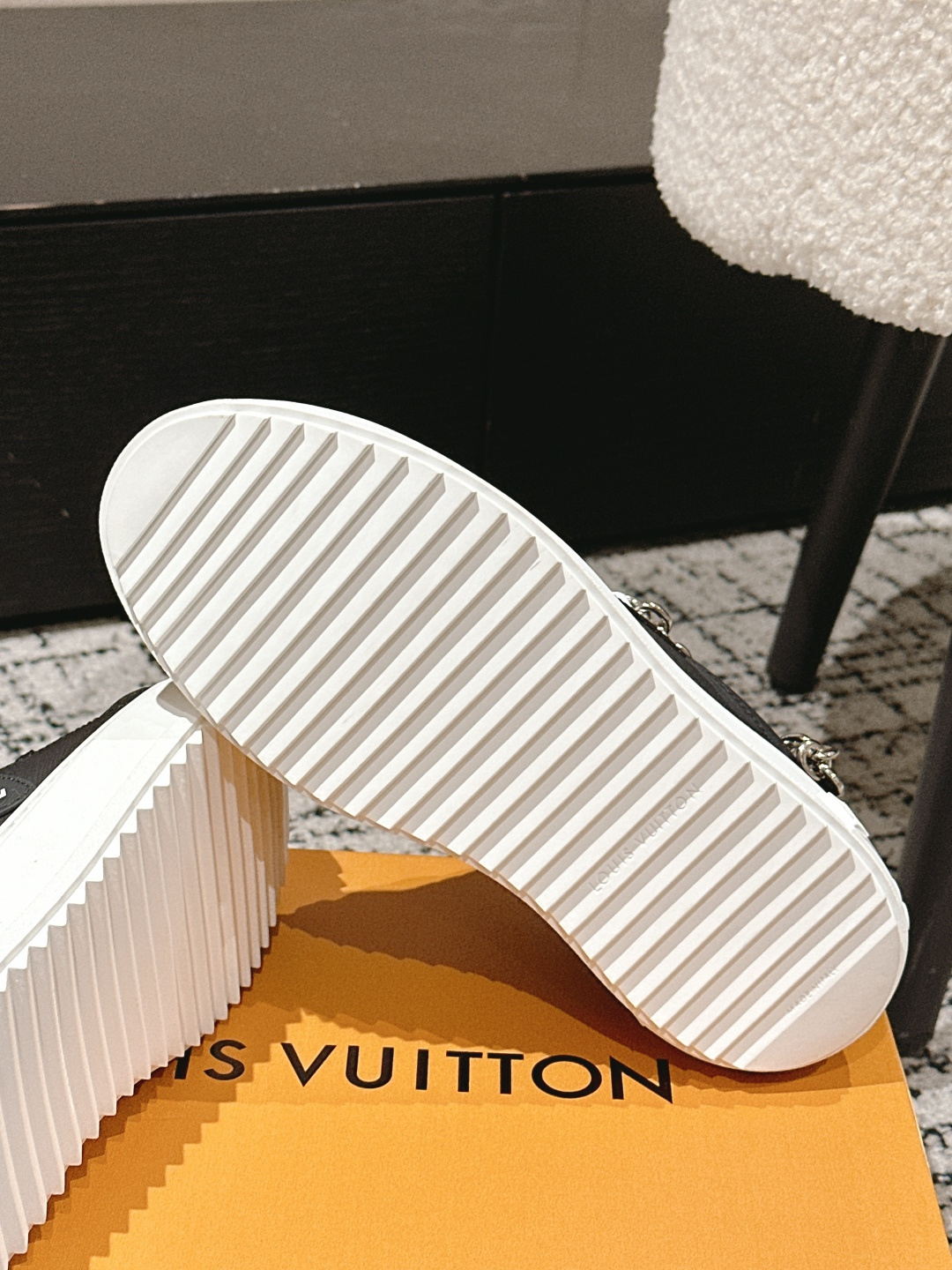 Louis Vuitton Women's Black Leather Sneakers with Gold Chain Detail