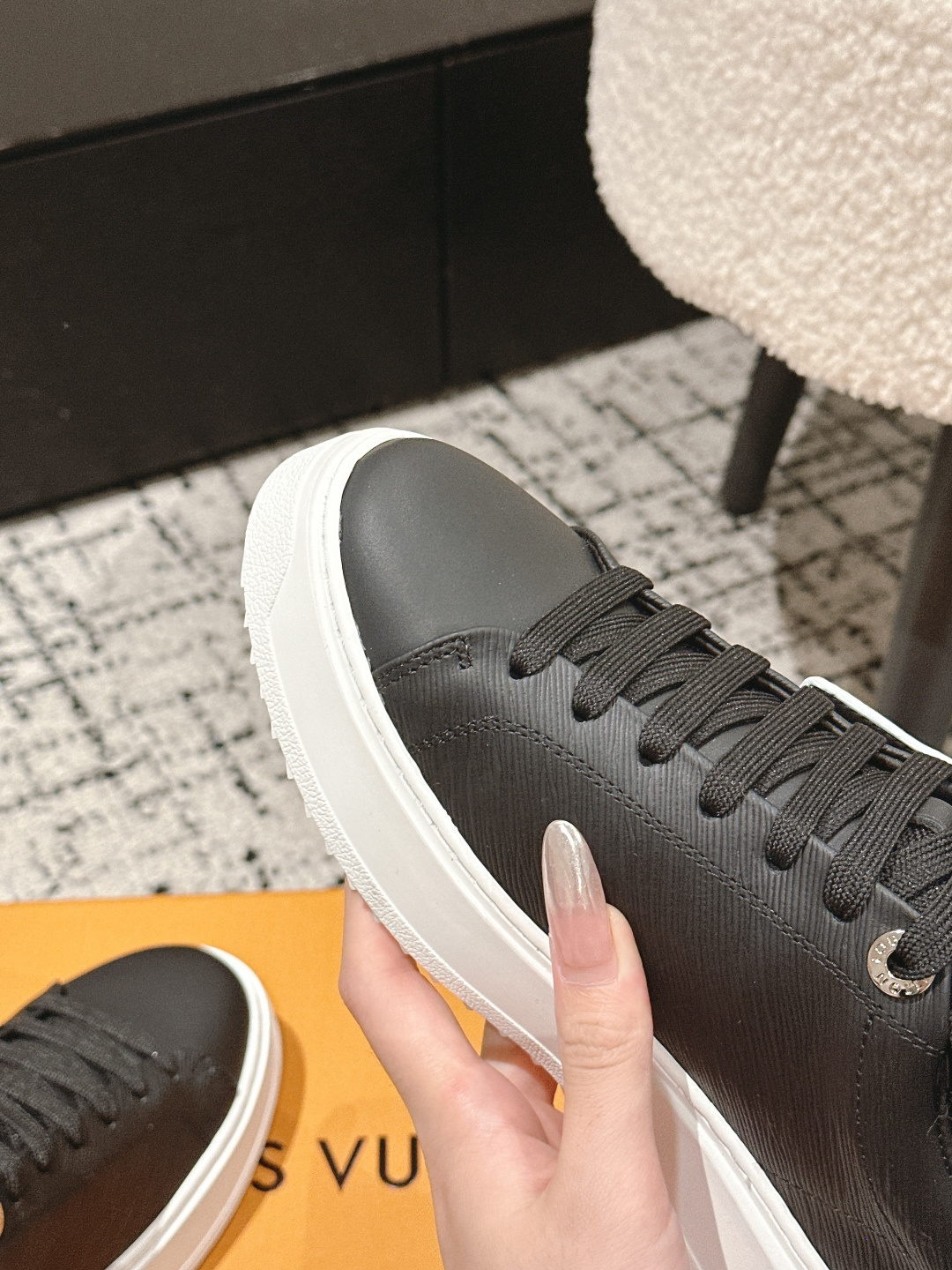 Louis Vuitton Women's Black Leather Sneakers with Gold Chain Detail