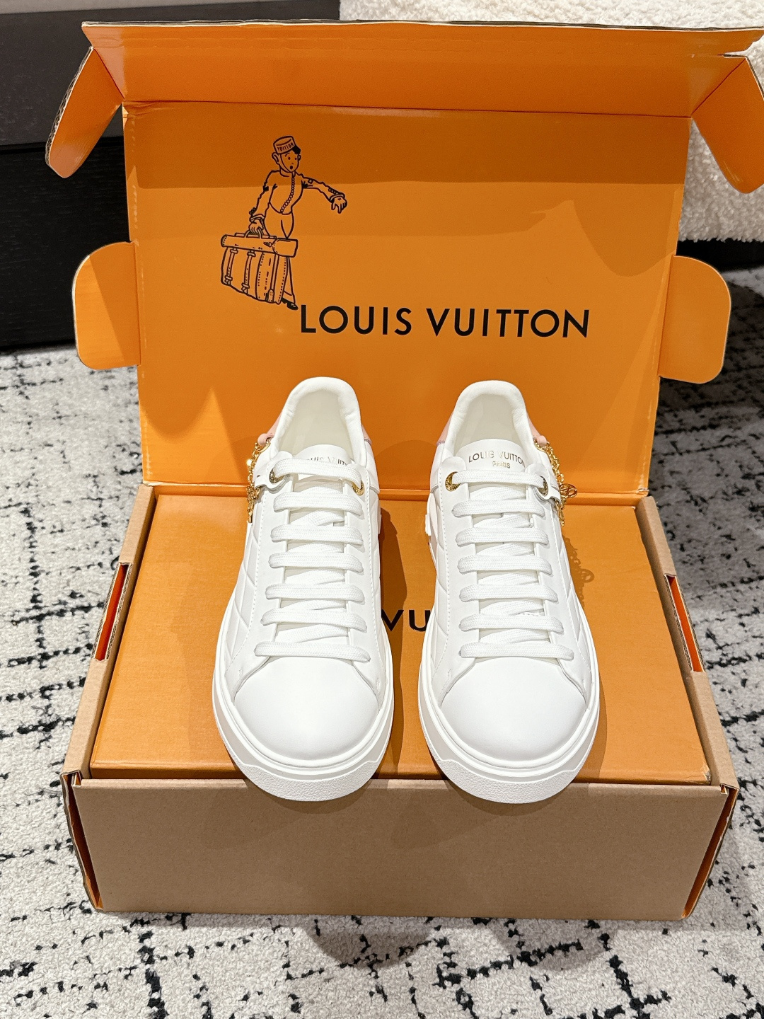 Louis Vuitton Women’s White Leather Sneakers with Gold Charms