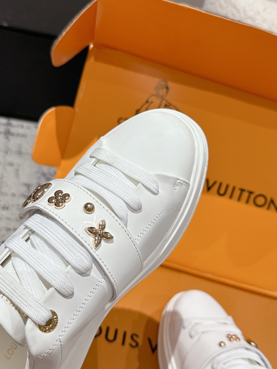 Louis Vuitton White Leather Sneakers with Iconic Gold Charms