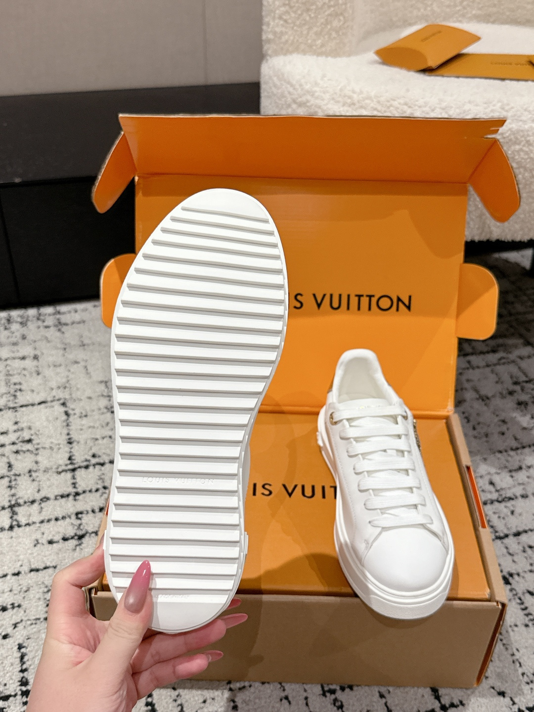 Louis Vuitton Women's White Leather Sneakers with Gold Accents