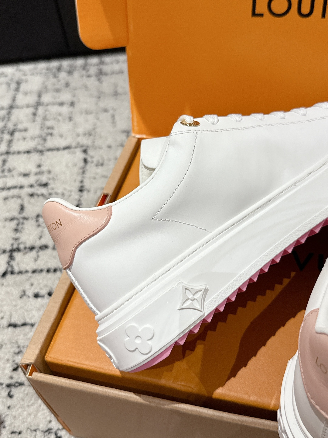 Louis Vuitton Women's White Leather Sneakers with Pink Flower Charm