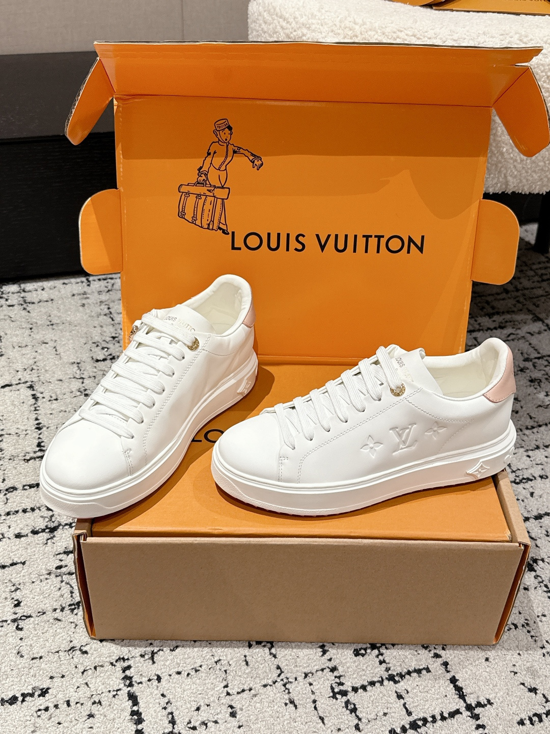 Louis Vuitton Women's White Leather Sneakers with Pink Flower Charm