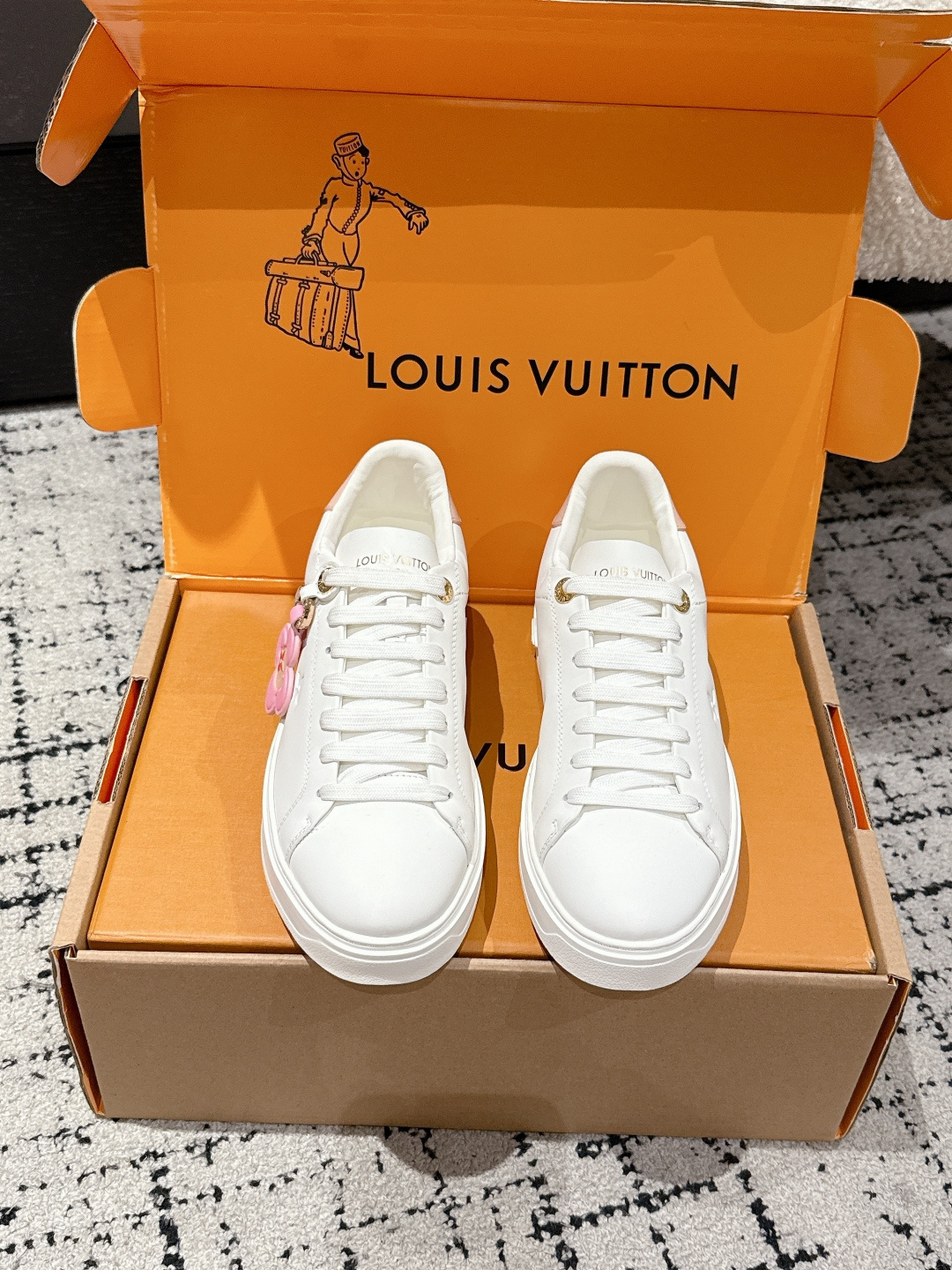 Louis Vuitton Women’s White Leather Sneakers with Pink Flower Charm